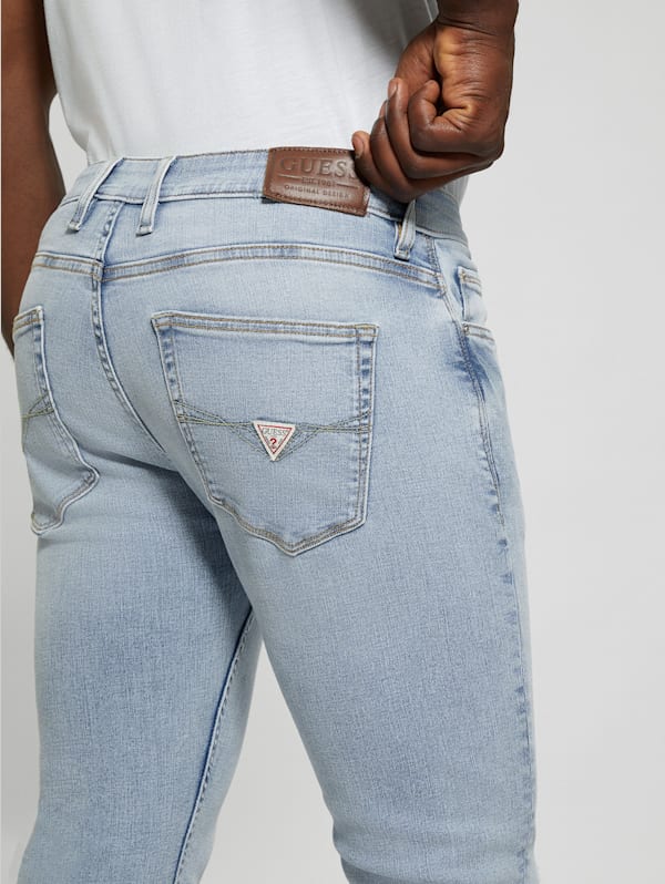 Distressed Low-Rise Slim Straight Jeans | GUESS Canada