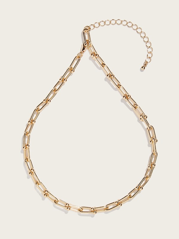 Gold guess necklace on sale