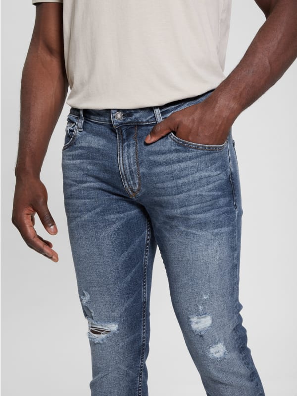 Finnley Distressed Tapered Jeans | GUESS