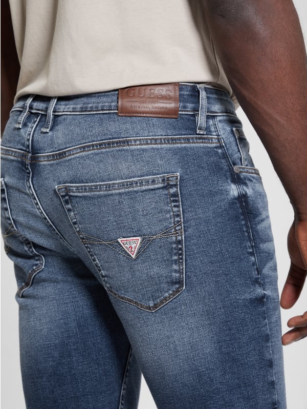 Finnley Distressed Tapered Jeans | GUESS