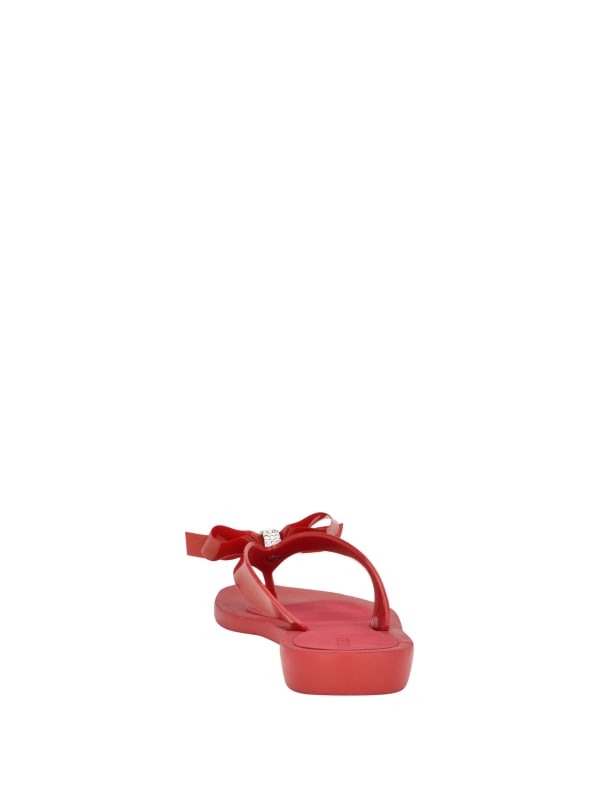 Guess bow tie on sale flip flops