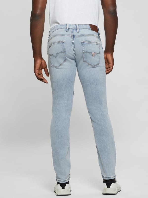 Distressed Low-Rise Slim Straight Jeans