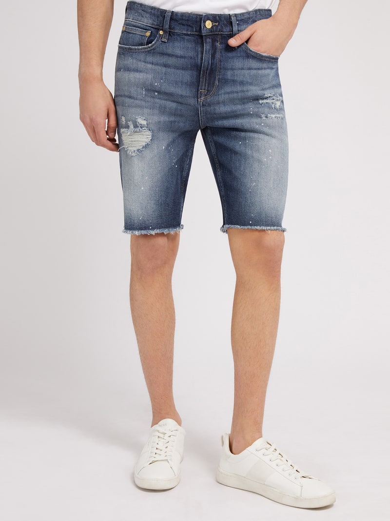 Shorts in jeans con abrasioni