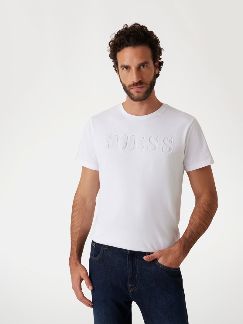 Pull en coton écru uni aspect gaufré avec un col camionneur et le logo brodé TOMMY JEANS - CCV Mode