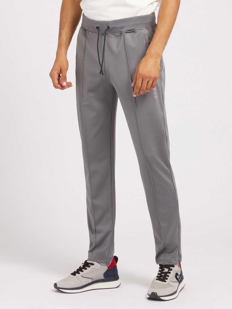 Pantalón jogger con logo lateral Hombre | GUESS® Sitio Oficial