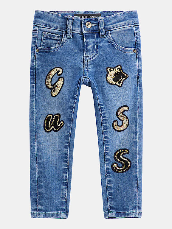 GUESS All over patch skinny denim pant