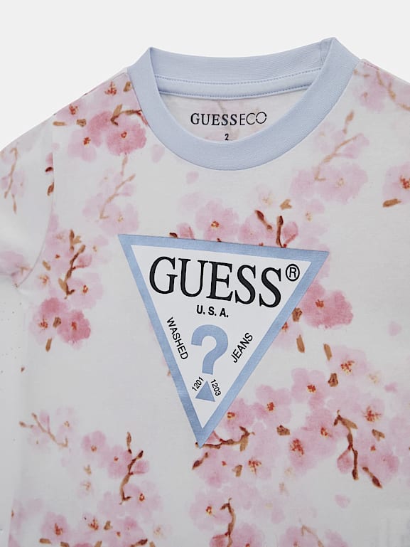 pink and white guess shirt