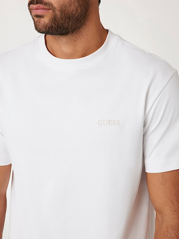 White guess logo t shirt store