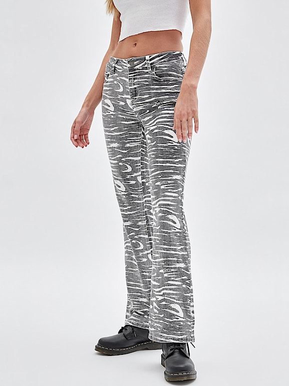 GUESS® Zebra print bootcut denim pant