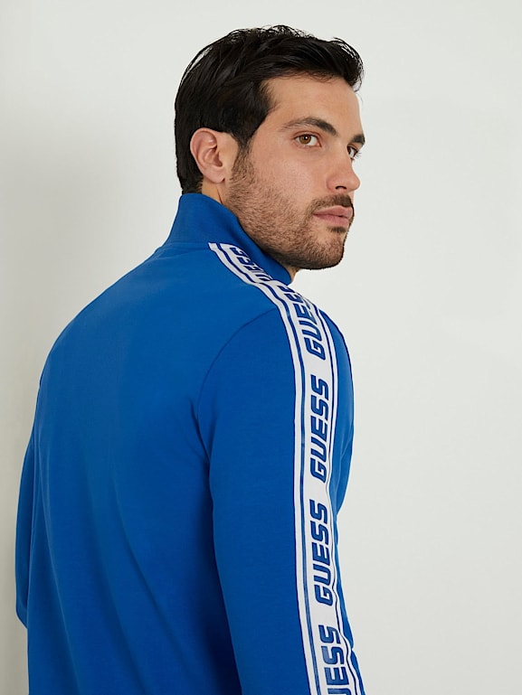 Guess track sales top