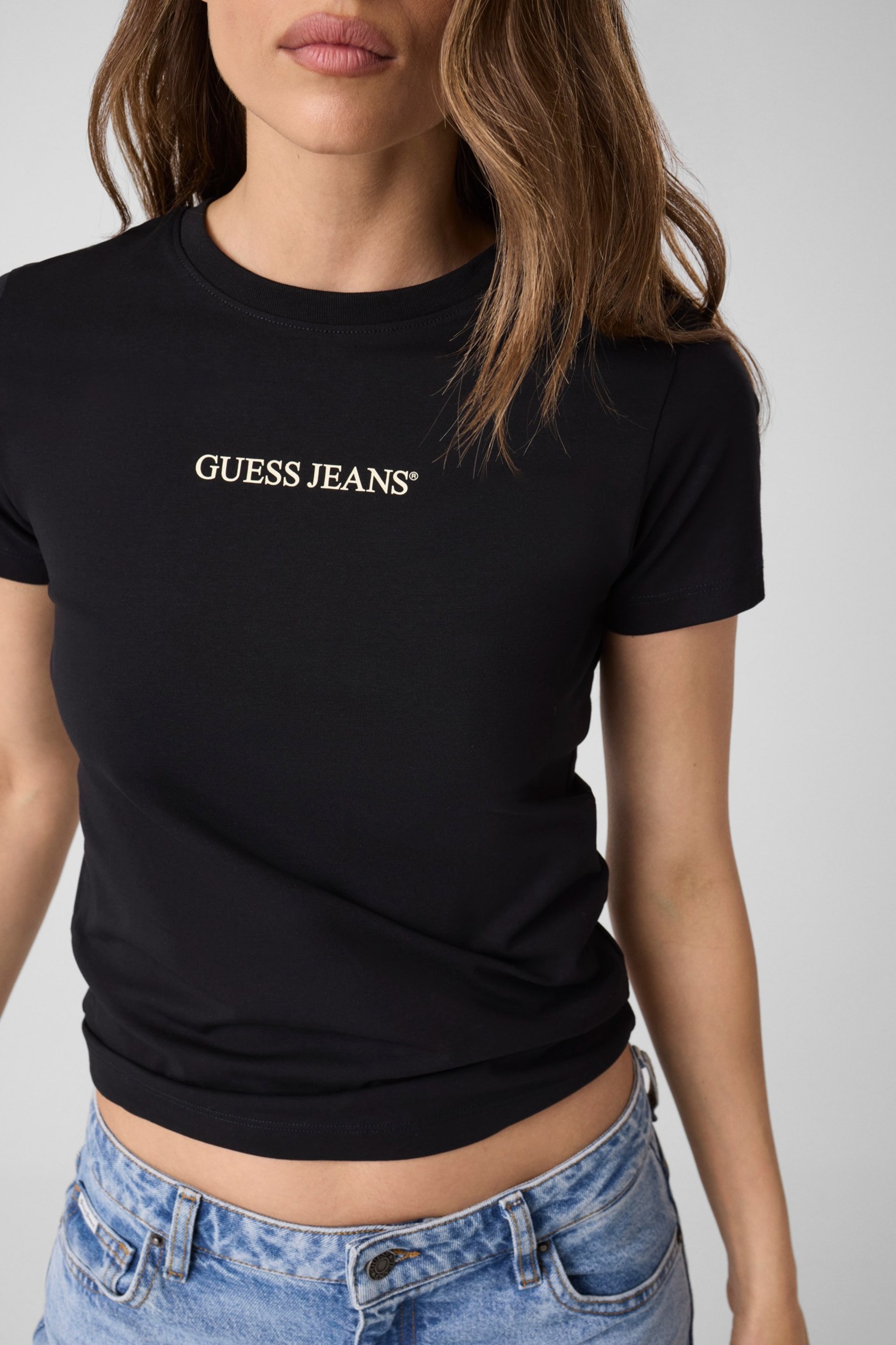 Strak T-shirt met logoprint Dames | GUESS Jeans®
