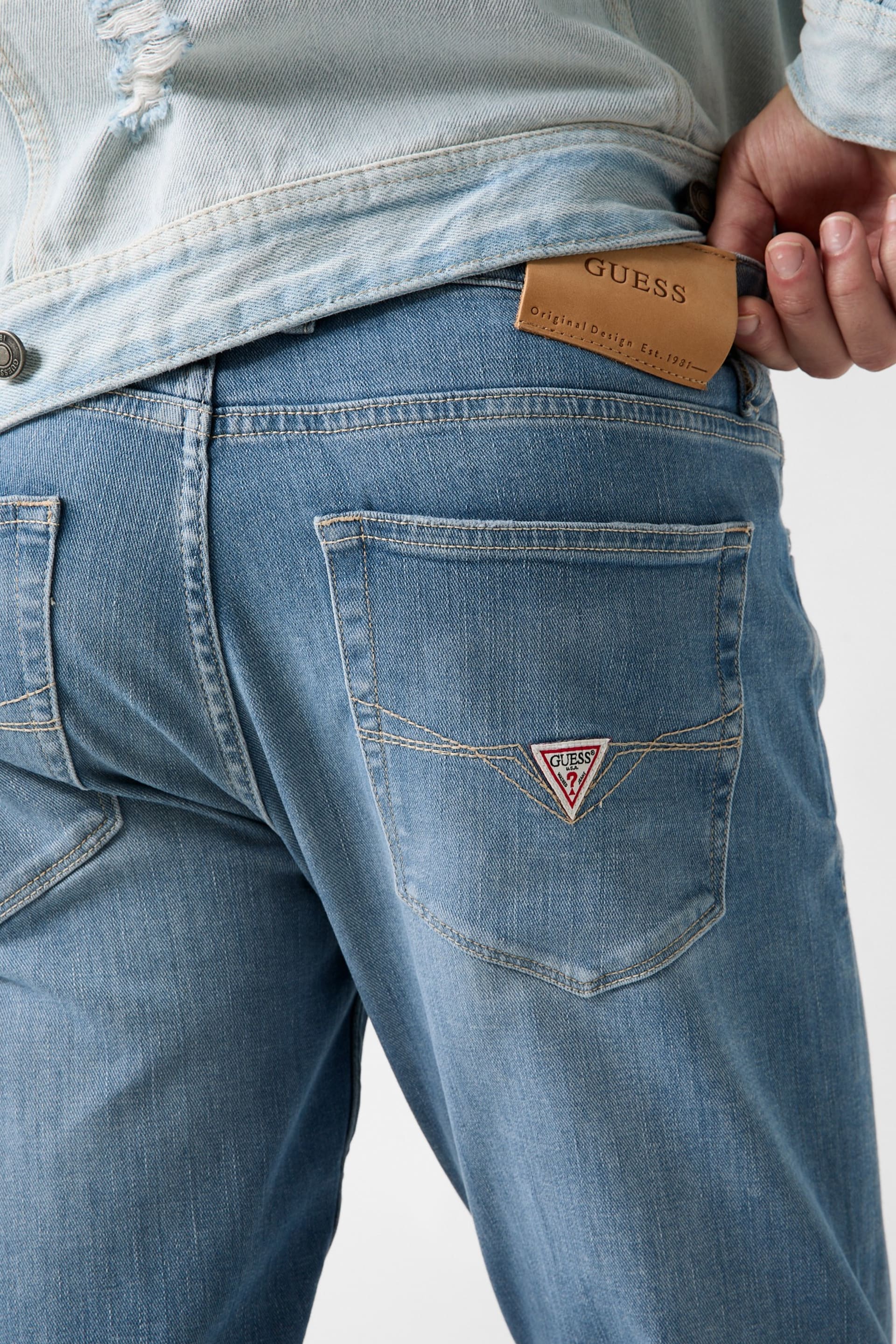 GUESS® Eco Finnley Slim-Fit Tapered Jeans Men