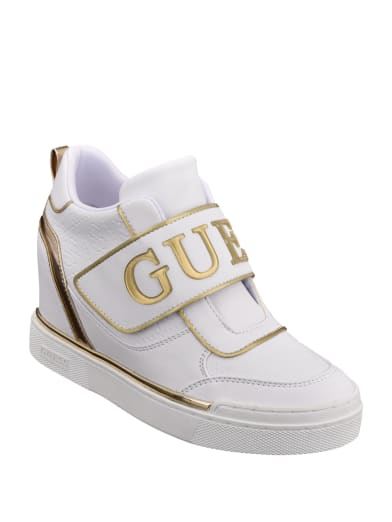 guess white wedge trainers