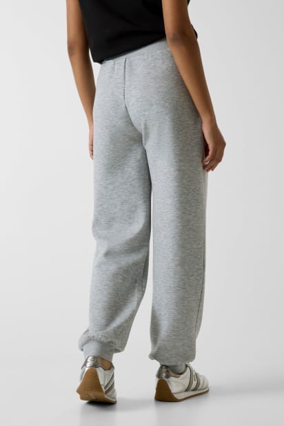 GUESS® Viskoz karışımlı jogger pantolonlar Kadın