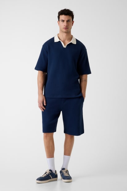 GUESS® Üçgen logo polo Erkek