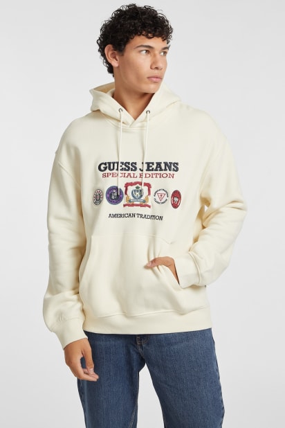 【新品未開封】完売品guess hyunjin着用　パーカー GUESS® Special Edition Hoodie