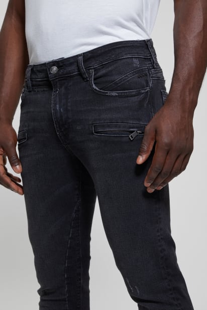 GUESS® Eco Finnley Zippered Tapered Jeans