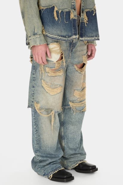 GUESS® destroyed denim layered pant