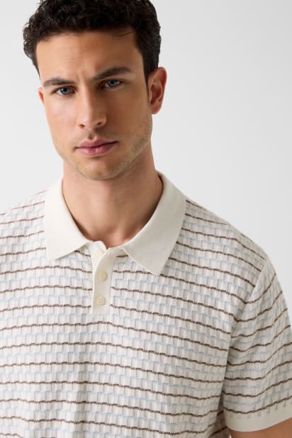 GUESS® Striped sweater