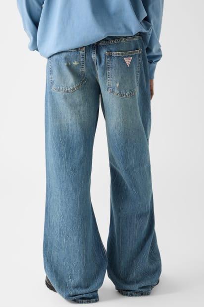 【インディゴブルー(HKST)】GUESS Originals デニムパンツ (W)Tapered Baggy GUESS Originals Tapered Baggy デニムパンツ | GUESS(ゲス) JAPAN