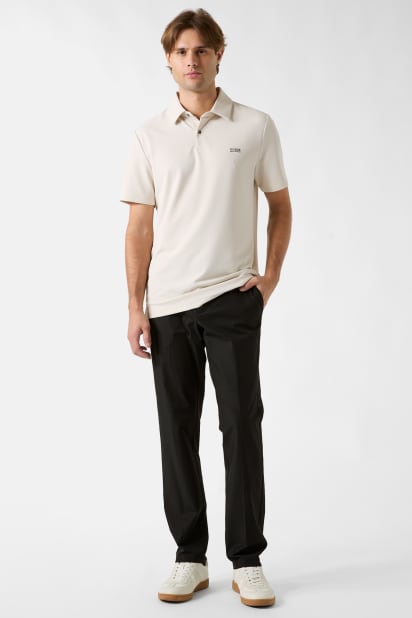 GUESS® Embroidered logo polo