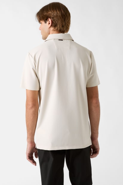 GUESS® Embroidered logo polo