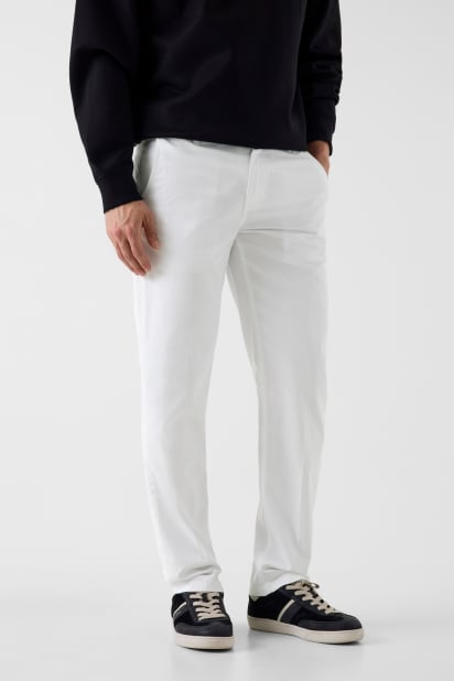 GUESS® Chino pants