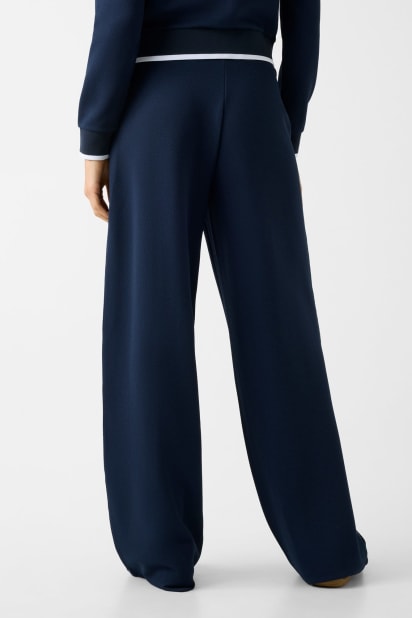 GUESS® Flare-leg sweatpants