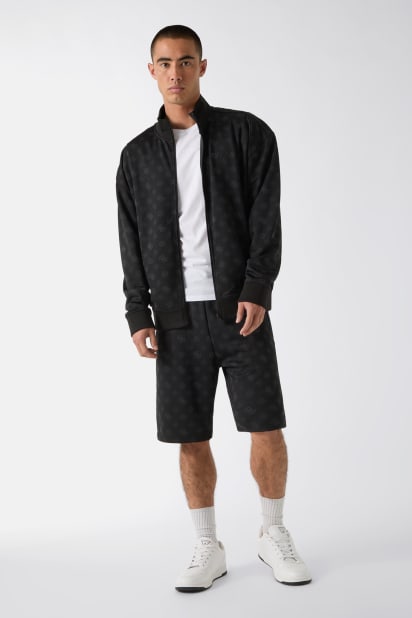 GUESS® All over logo shorts