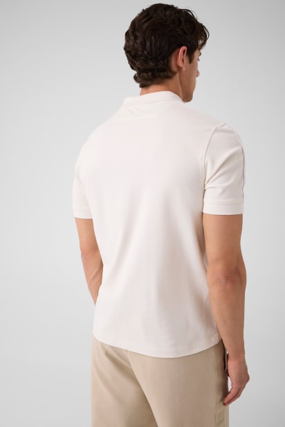 GUESS® Logo polo shirt