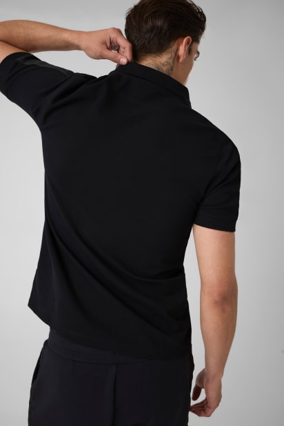 GUESS® Logo polo shirt