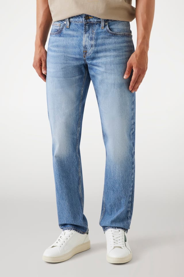 Vaqueros slim con estampado de &aacute;ngeles