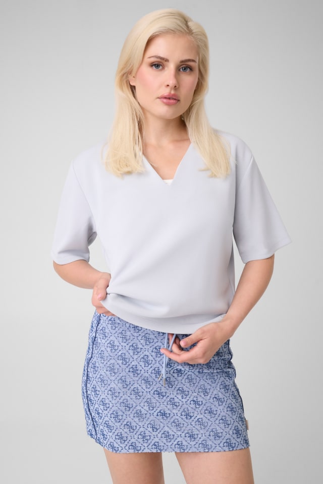 Top de punto tipo polo