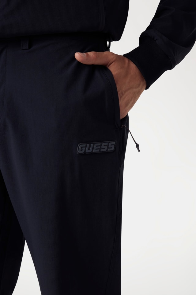 Streç yırtılmaz pantolon Erkek | GUESS® Geçmiş Koleksiyonlar