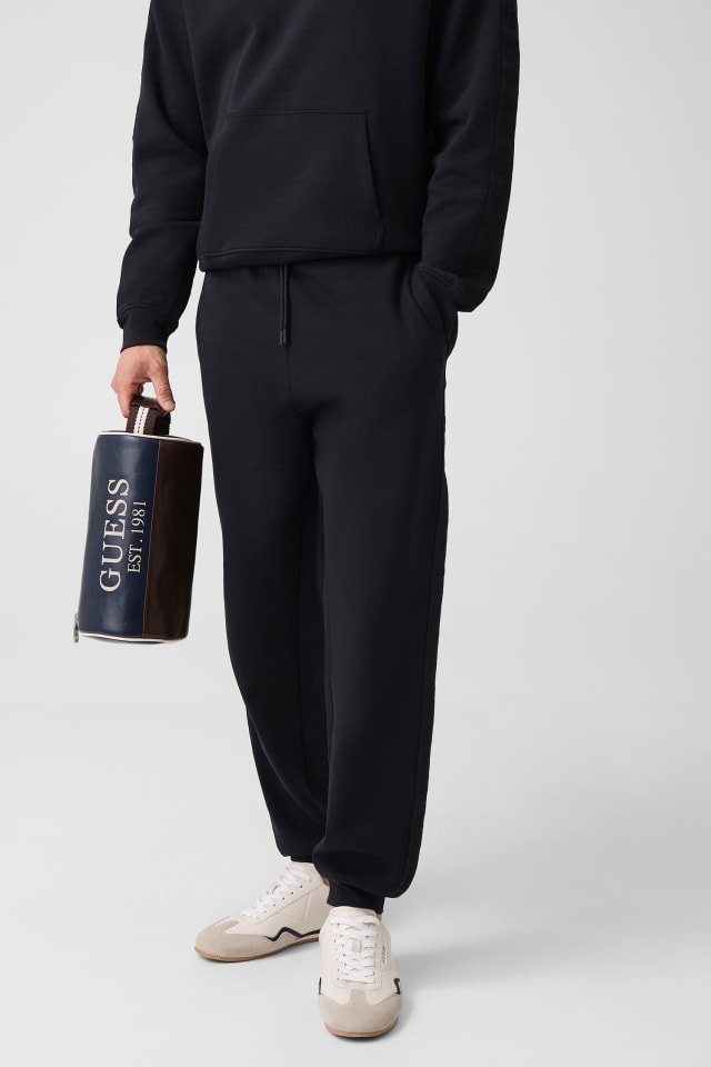Joggers con logo lateral