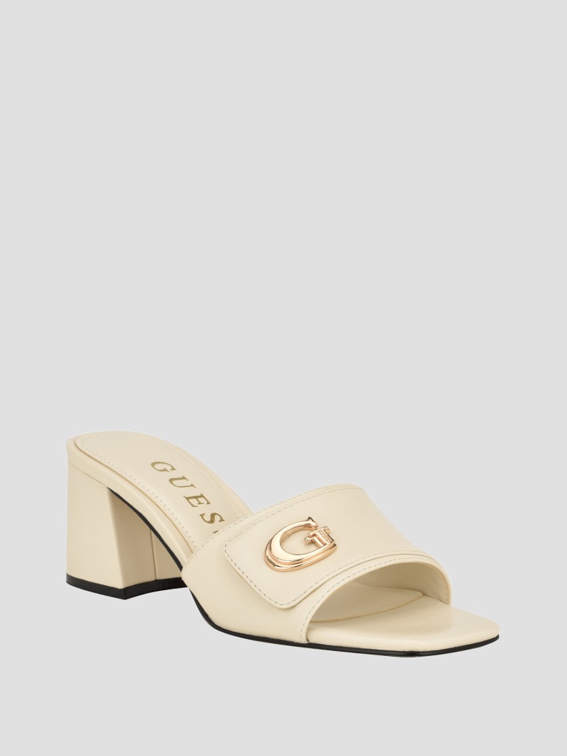 White block deals heel mules