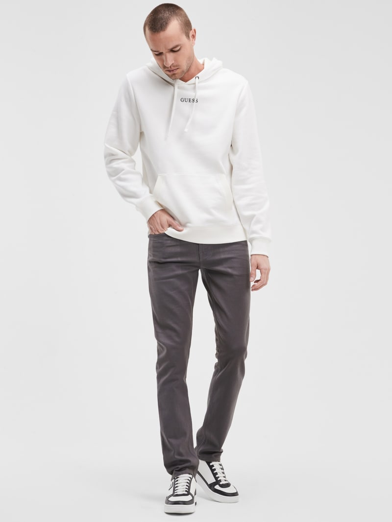 Guess tapered jeans sales