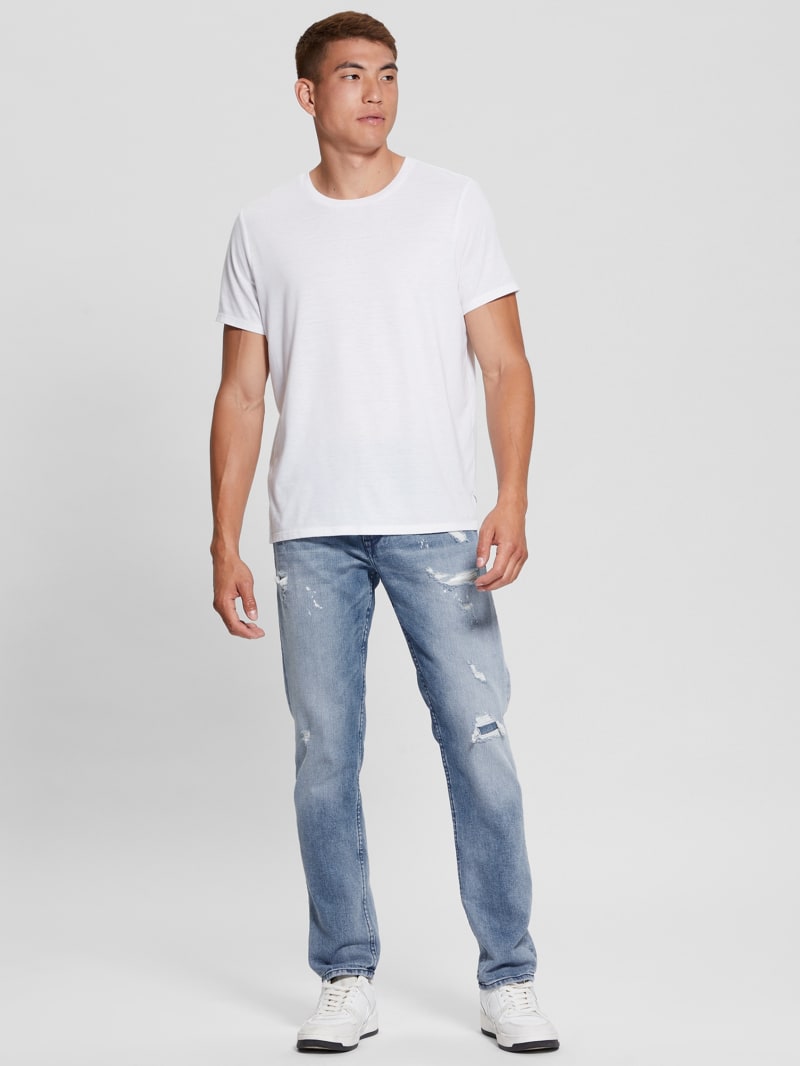 Eco Rip-and-Repair Tapered Jeans | GUESS Canada