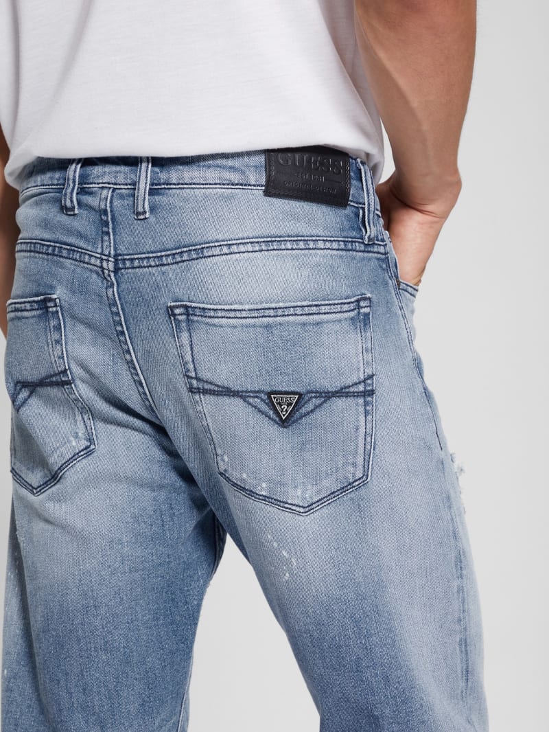 Eco Rip-and-Repair Tapered Jeans | GUESS Canada