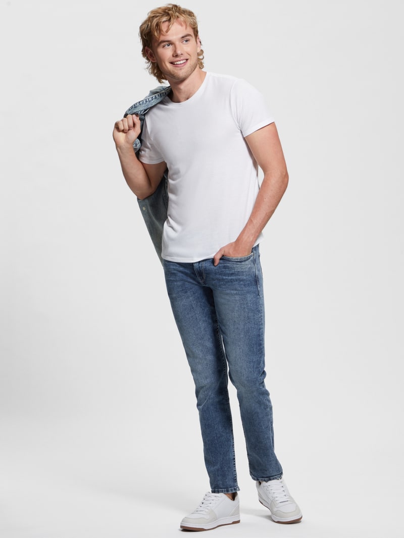 GUESS Slim Tapered Jeans In Dusty Indigo Destroy Wash, $128, GUESS