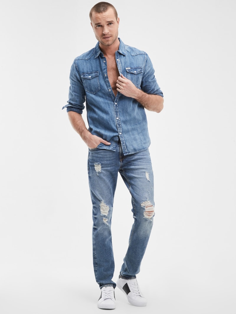 GUESS Slim Tapered Jeans In Dusty Indigo Destroy Wash, $128, GUESS