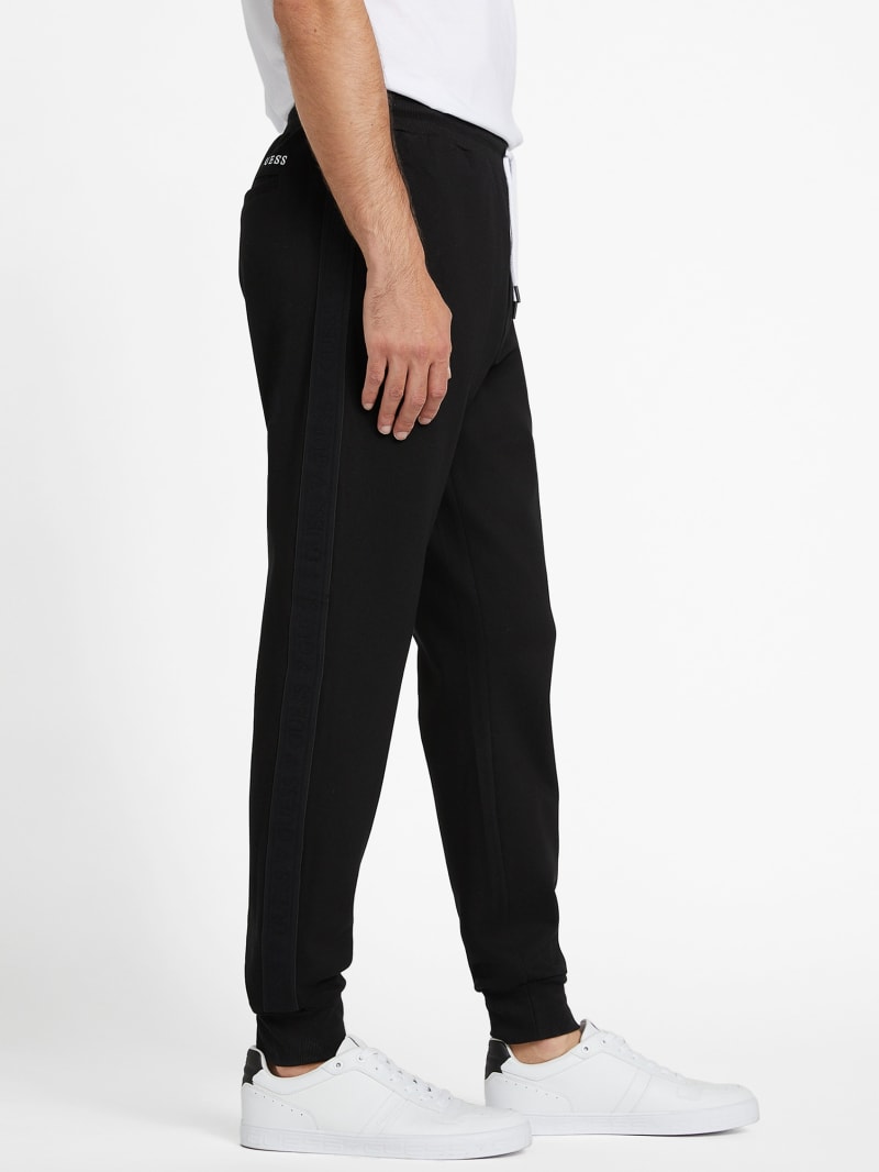 Guess JOGGING - Tracksuit bottoms - schwarz/black 