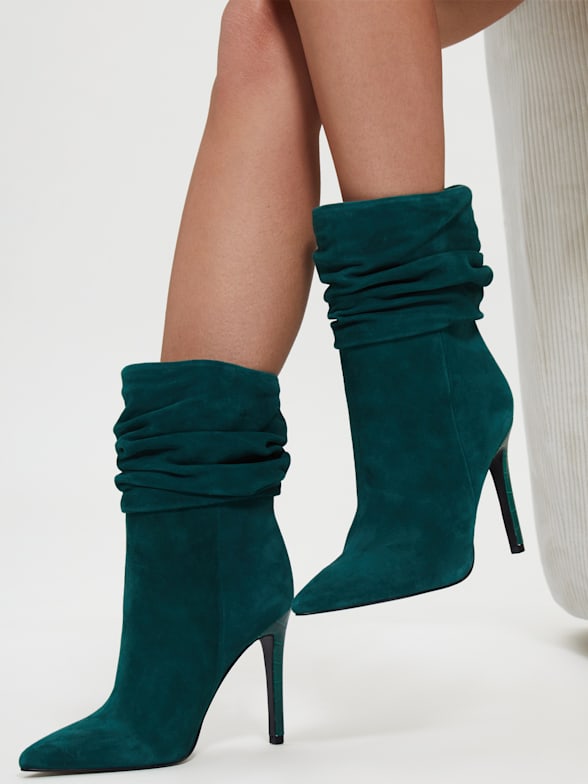 guess women's haler lace up combat booties