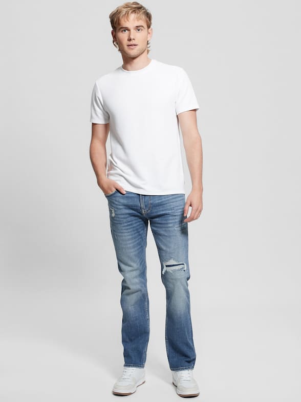 Distressed Low-Rise Slim Straight Jeans