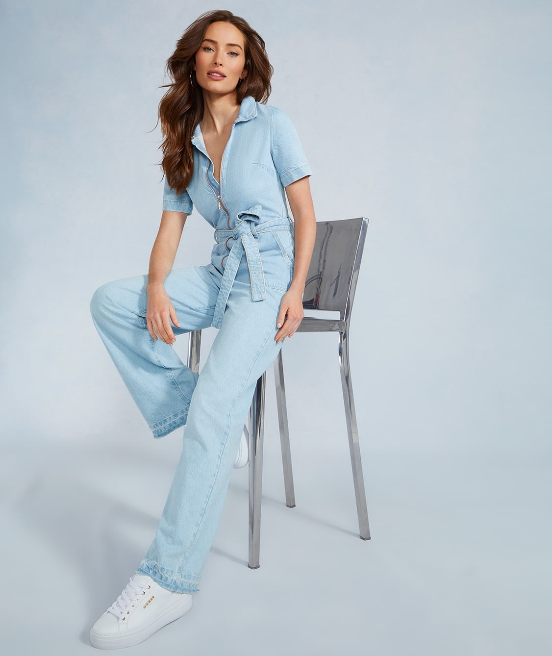 Explore iconic denim in one-pieces and jeans.