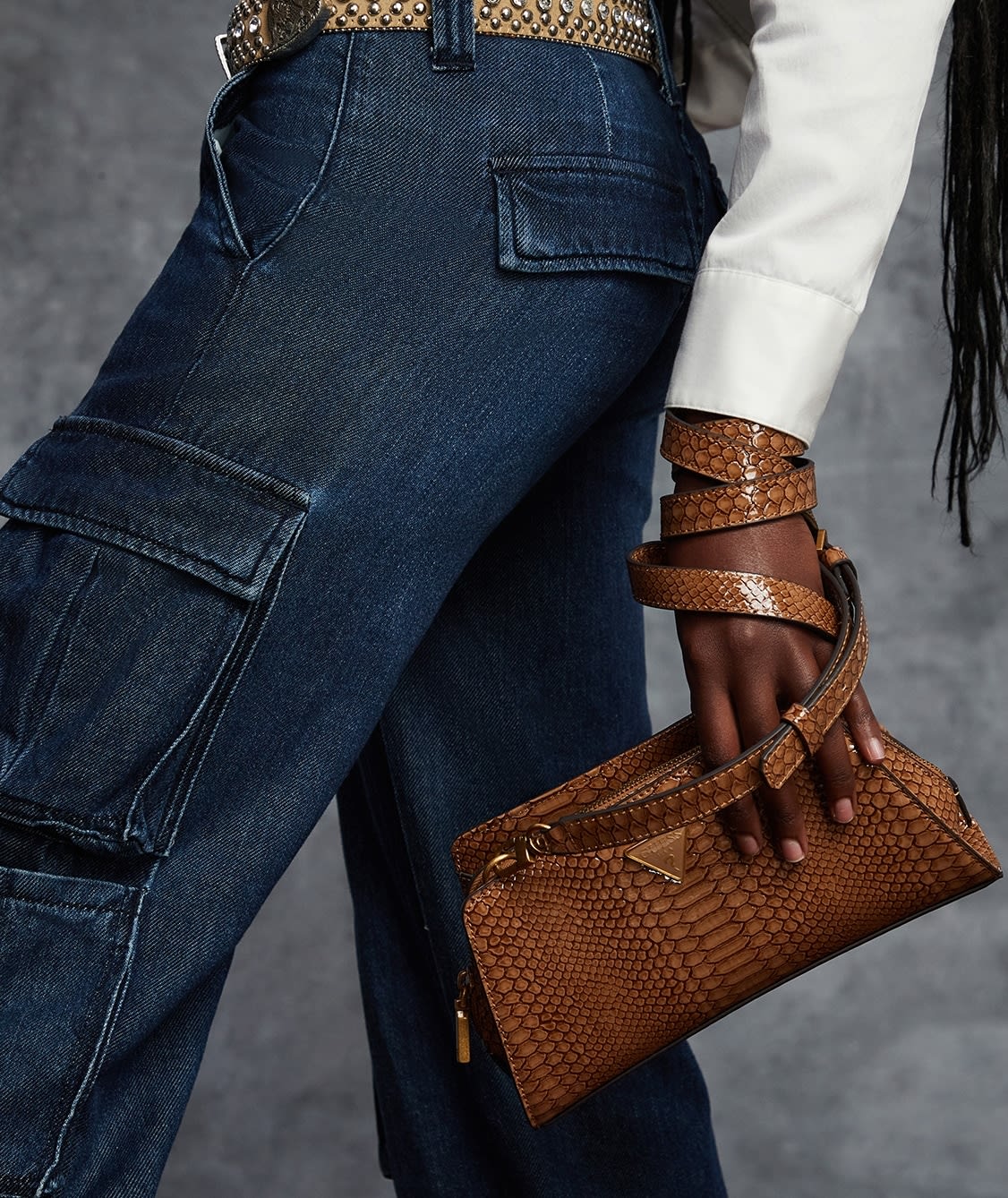 Shop the It-Bag featuring chic textured detailing.