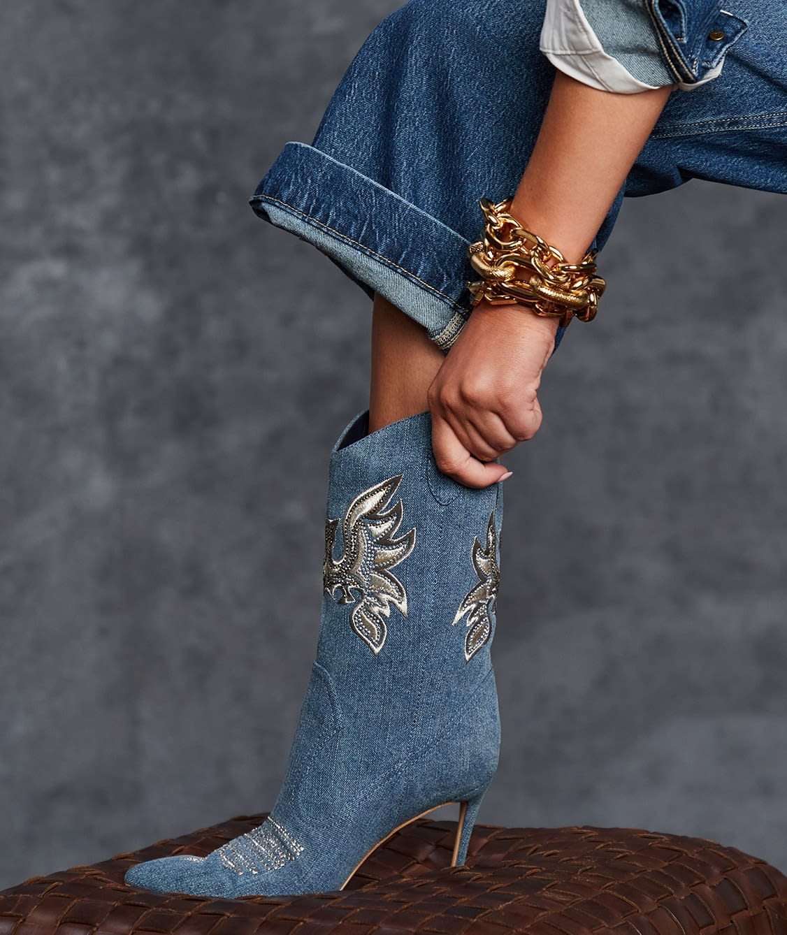 Shop shoes, featuring our denim western heled booties.