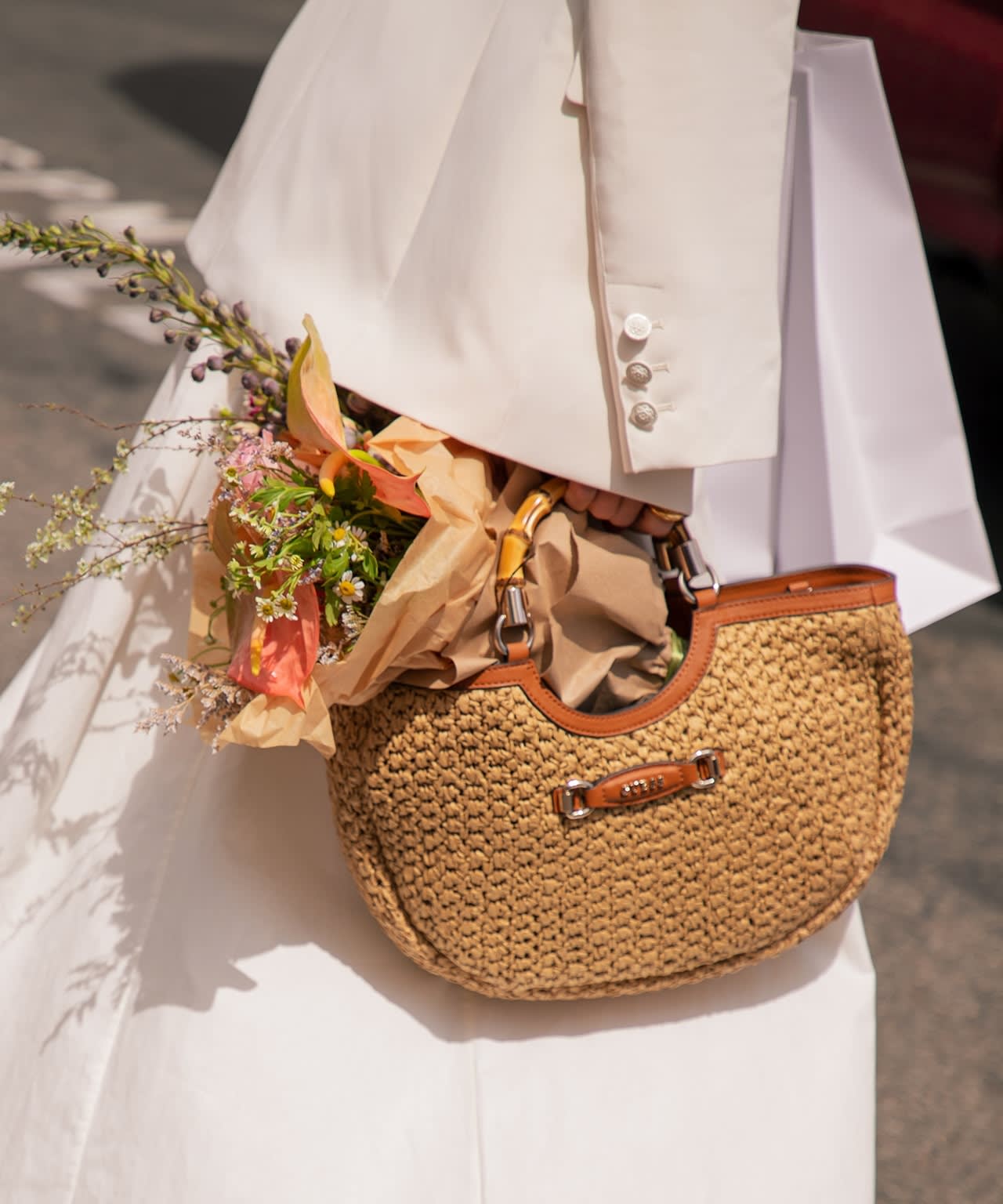 Featuring the Siria Straw Top Handle Bag